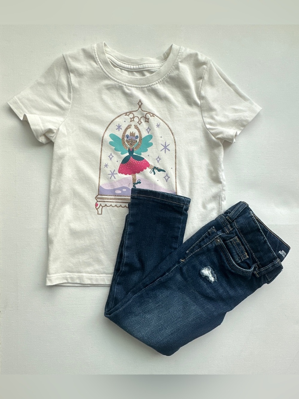 Cat & Jack girl’s White Fairy Tee with Teal and Pink Graphic.  Size 4T.